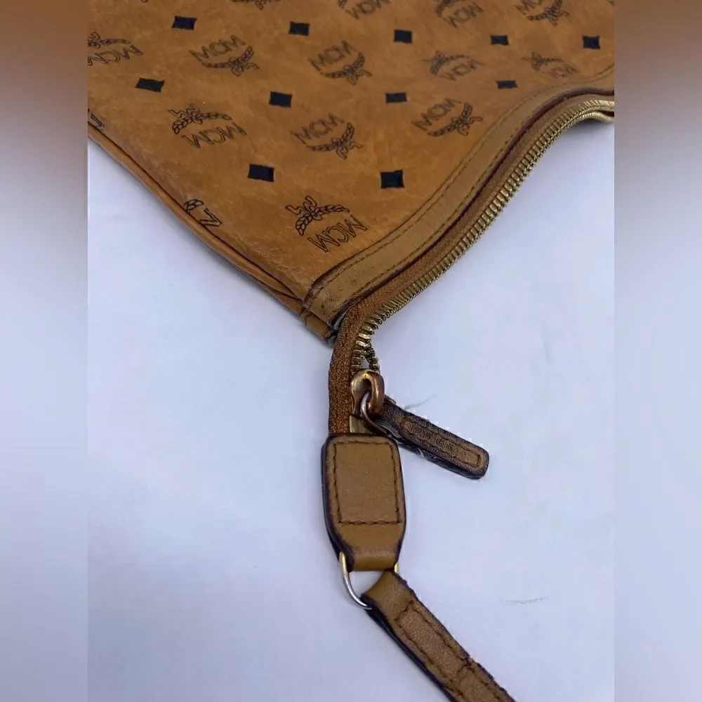 MCM authentic Cognac visetos zip Pouch entrupy COA